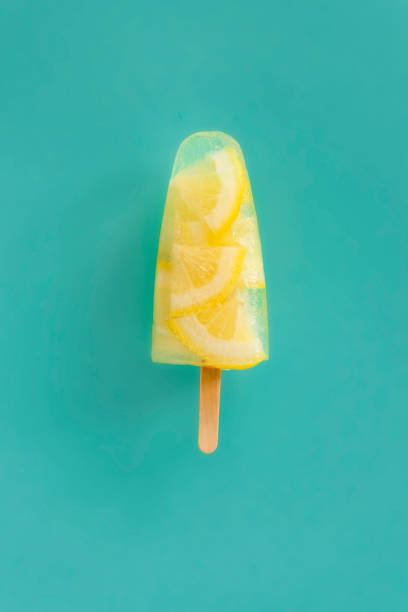istock fruit popsicle lemon ice on turquoise background with space for txt 1098363080