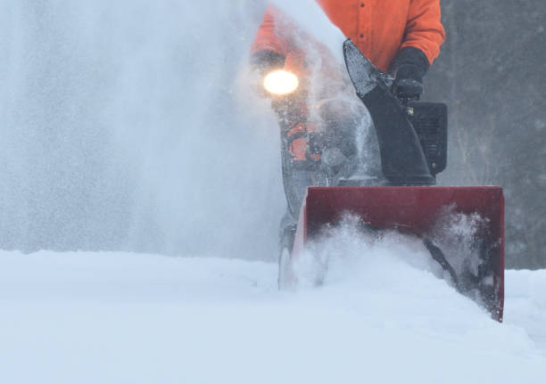 Man Snow Blowing Driveway New Brunswick Canada