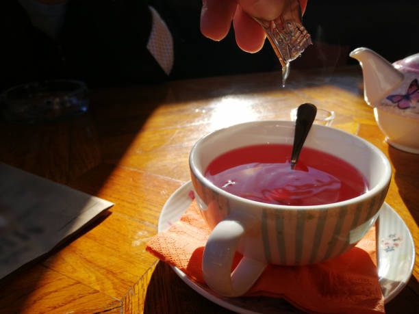 istock Cup of fruit tea with teapot 1098364932