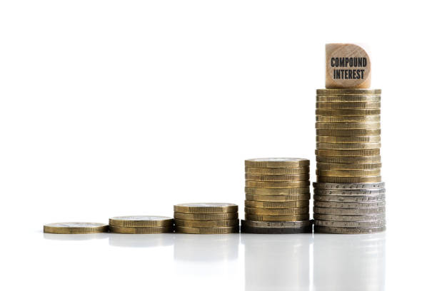 istock stacked coins symbolizing compound interest effect with the word 
