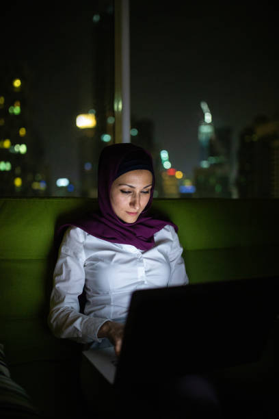 istock Beautiful Muslim woman using lap top 1098366062