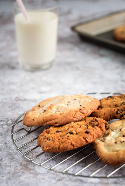 istock Freshly baked cookies on baking tray 1098370792