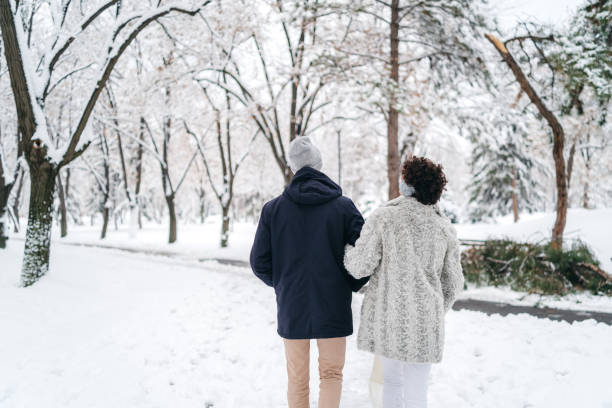 istock Young couple in the snow 1098374188