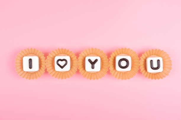 istock I love you engraved in chocolate on colored background 1098376510