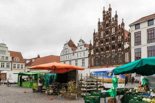 Greifswald, Germany, April 7, 2017 - Weekly market on the market square of Greifswald in Mecklenburg-Vorpommern.