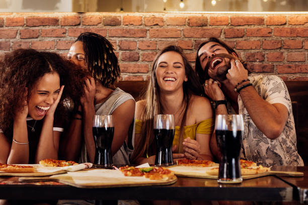 istock Cheerful young friends hanging out at restaurant 1098380646