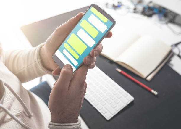 istock person using messaging app mock-up on smartphone 1098384838