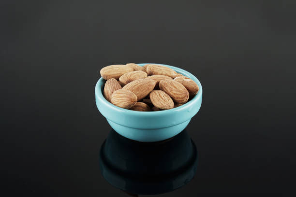 Dried almonds in bowl