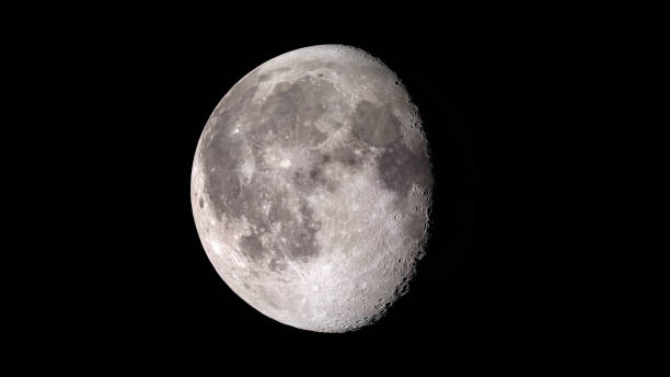 istock Waning gibbous moon on black sky 1098386052