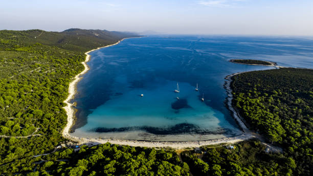 Aerial View on a Bay of an Island in Mediterranean Sea Aerial View on a Bay of an Island in Mediterranean Sea. dugi otok island stock pictures, royalty-free photos & images