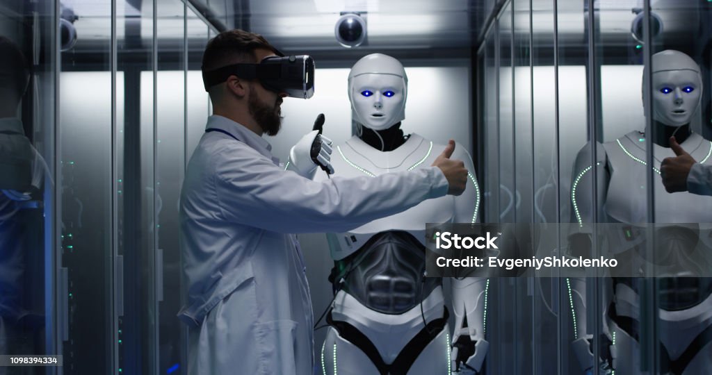 Robotics Test Engineer Engineer Testing On Robot Controls Stock Photo - Download Image Now ...