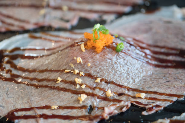 Sliced beef sushi with sauce and  fish roe - Japanese food style