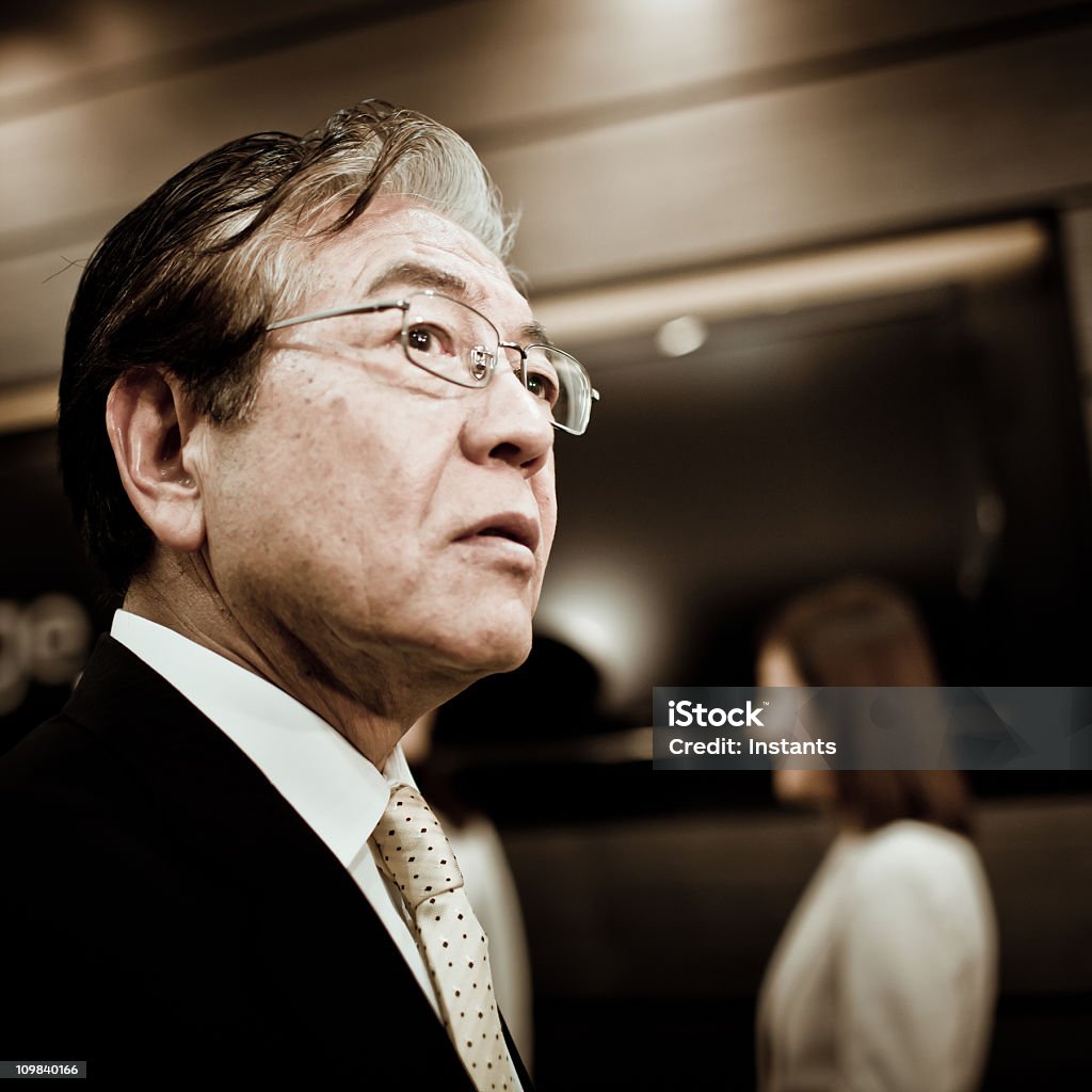 Concerned Concerned businessman Japanese Ethnicity Stock Photo