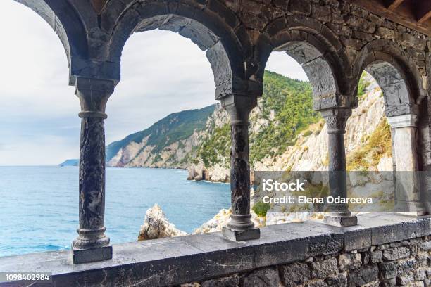 View Through Columns Of Church Of St Peter In Portovenere Or Porto Venere Town On Ligurian Coast Italy Stock Photo - Download Image Now