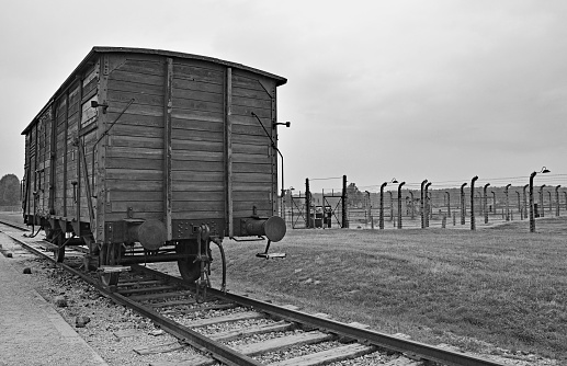 Oswiecim, Poland - July 11th 2018.  A train car on the unloading platform at the Birkenau-Auschwitz concentration camp, a symbol of the deportation of Jews from Hungary to Auschwitz in mid-1944