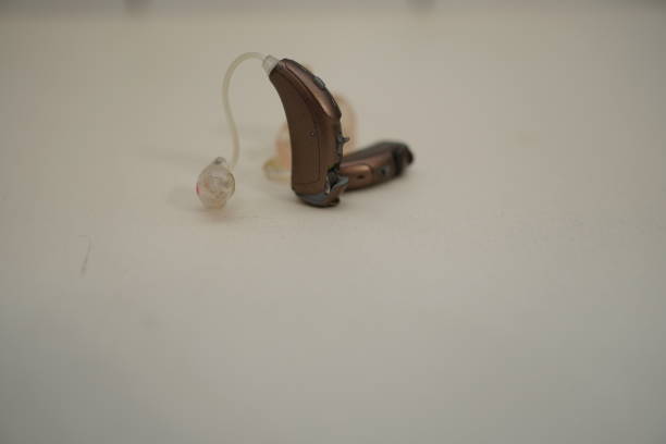 istock Hearing aid on white isolated background. Deaf ear aid. 1098407264