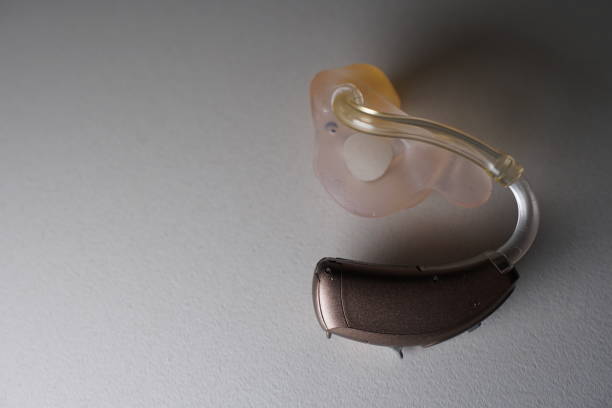 istock Hearing aid on white isolated background. Deaf ear aid. 1098410704