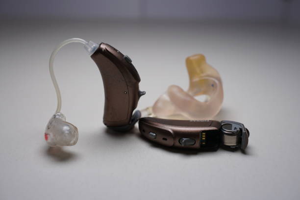 istock Hearing aid on white isolated background. Deaf ear aid. 1098411946