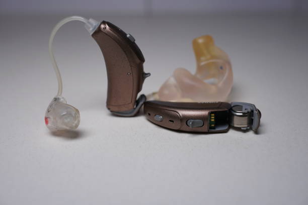 istock Hearing aid on white isolated background. Deaf ear aid. 1098411962