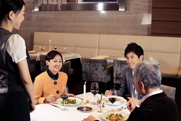 Japanese Family in Restaurant stock photo