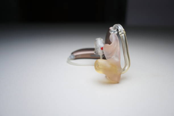 istock Hearing aid on white isolated background. Deaf ear aid. 1098413770