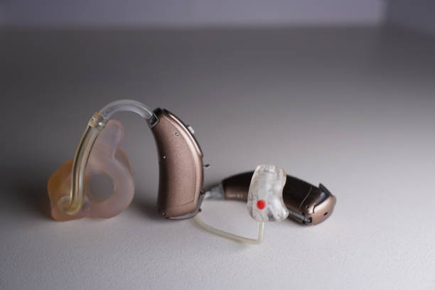 istock Hearing aid on white isolated background. Deaf ear aid. 1098414906