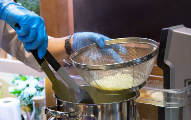 istock Chef cooking food in the kitchen, Chef preparing food 1098415372