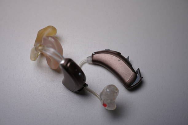 istock Hearing aid on white isolated background. Deaf ear aid. 1098415440