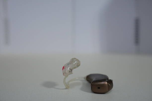 istock Hearing aid on white isolated background. Deaf ear aid. 1098415594