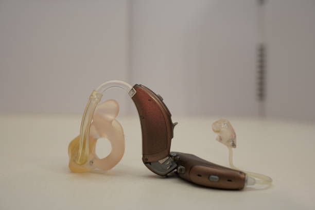 istock Hearing aid on white isolated background. Deaf ear aid. 1098415938