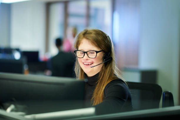 teenager office intern a young school leaver working in an office headset photos stock pictures, royalty-free photos & images