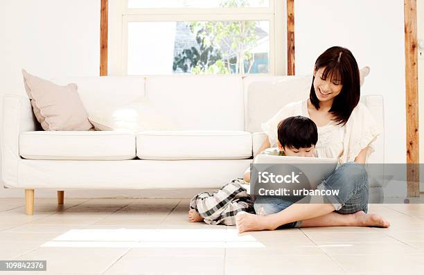 Mother And Son With Laptop Stock Photo - Download Image Now - Family, Bright, Home Interior