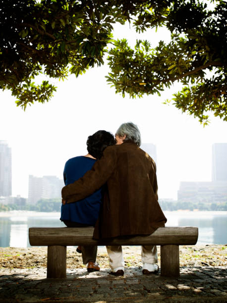 istock Older Couple on a Park Bench 109842498