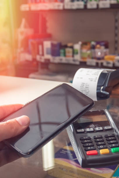 istock Wireless payment by smartphone via the terminal with NFC 1098427518