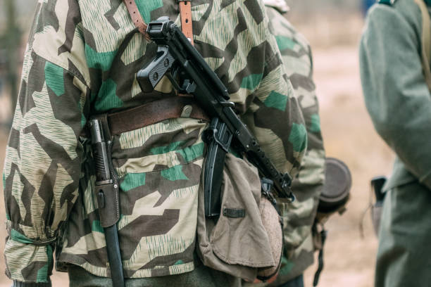 istock German soldier with a Soviet machine gun PPS-43 on his back 1098427558