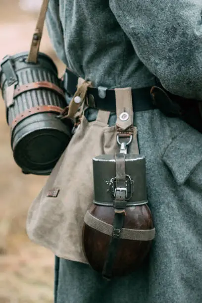 Flask to drink water on the belt of a German soldier during World War II