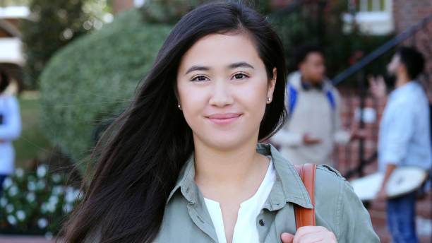 istock Cheerful female college student 1098428494