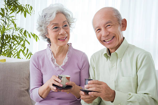 Happy Senior Couple with Tea stock photo