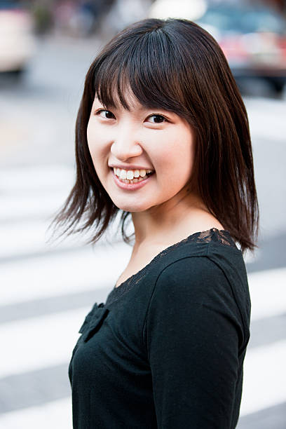 istock Woman looking back with a bright smile 109842888