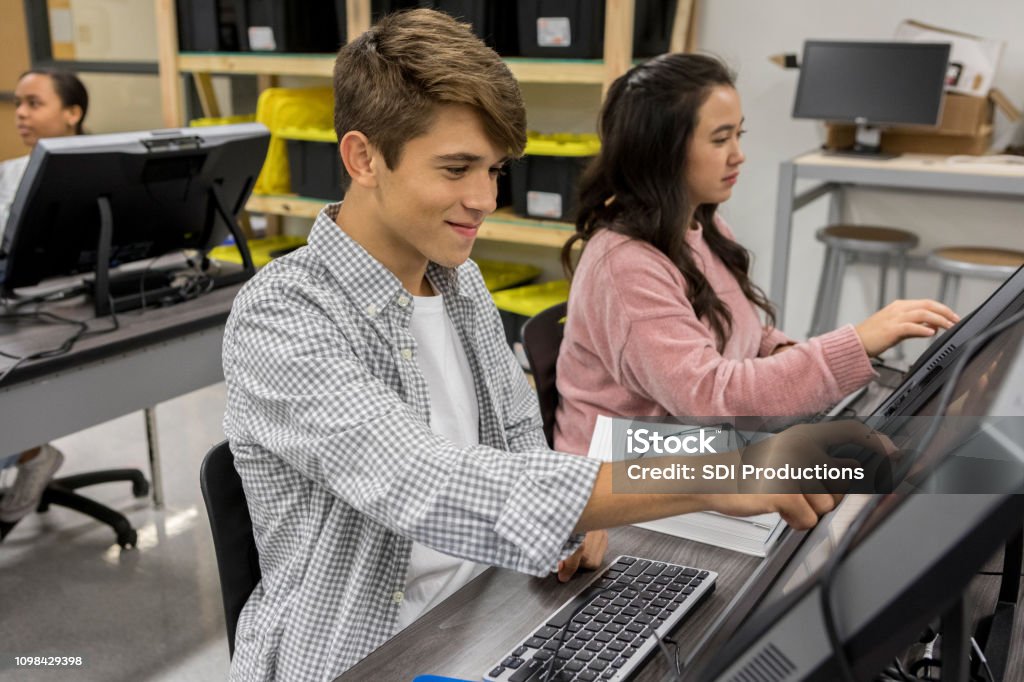 Student Using Touch Screen High School Students Using Touch Screen On Computers Stock Photo ...