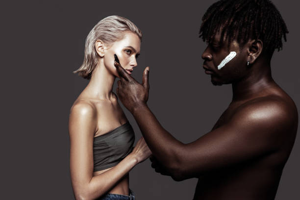 istock Man and woman participating in diversity campaign together 1098431892