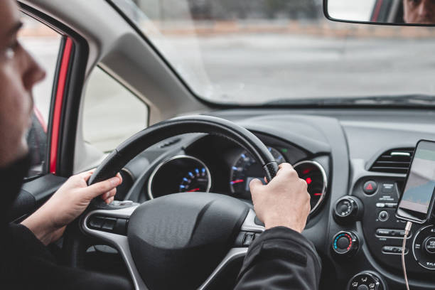 istock Man driving safely inside the car 1098432186