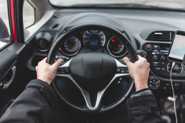 istock Man driving safely inside the car 1098432210