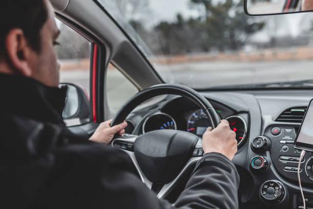 istock Man driving safely inside the car 1098432218
