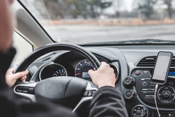 istock Man driving safely inside the car 1098432238