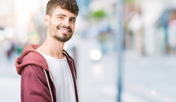 istock Young handsome man over isolated background Inviting to enter smiling natural with open hand 1098432486