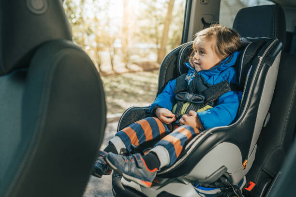 istock Child sitting and safe in car seat 1098432708