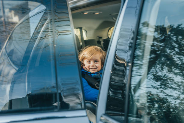 istock Child sitting and safe in car seat 1098432942