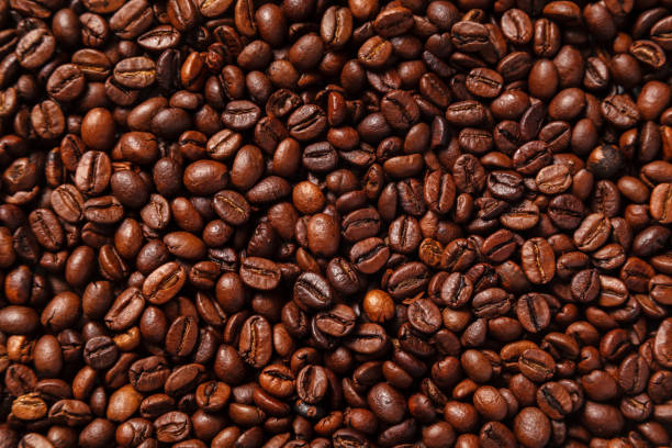 istock Roasted Coffee Beans background texture. Arabic roasting coffee. Brown coffee beans for background and texture. 1098439352