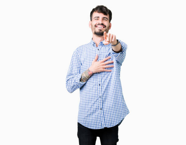 Young handsome business man over isolated background Laughing of you, pointing to the camera with finger hand over chest, shame expression Young handsome business man over isolated background Laughing of you, pointing to the camera with finger hand over chest, shame expression chest tattoos for men designs stock pictures, royalty-free photos & images